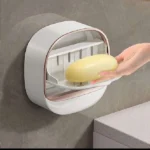 Wall-mounted soap holder