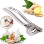 Ergonomic garlic press