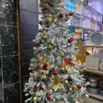 SNOW FLOCKED CHRISTMAS TREE