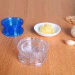 Twist garlic grinder