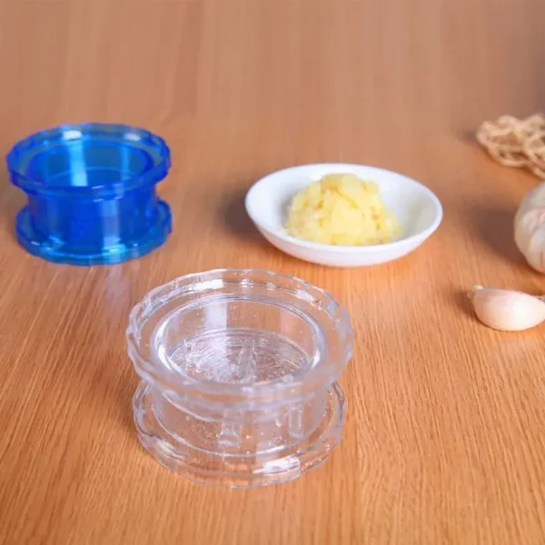 Twist garlic grinder