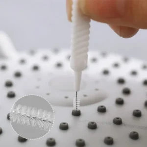 Shower head cleaning brushes