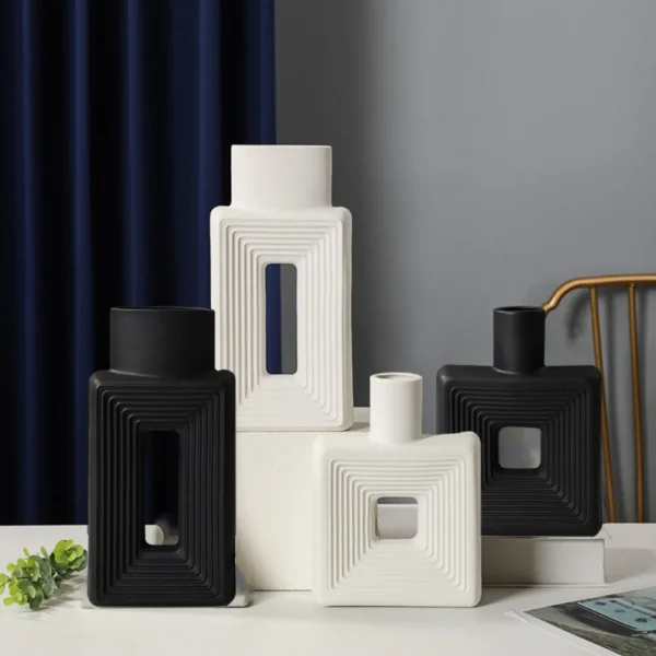 Black and white resin vases