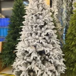 snow flocked Christmas tree