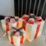 snow flocked gift boxes