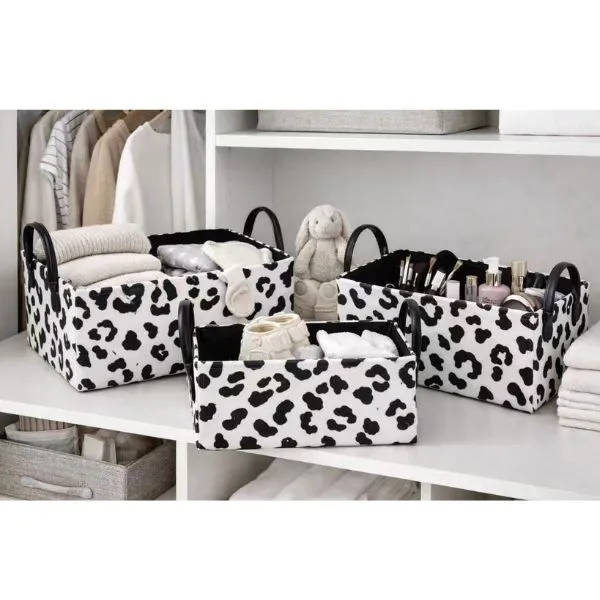 Cow print storage baskets