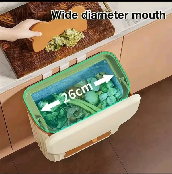 Under cabinet trash container