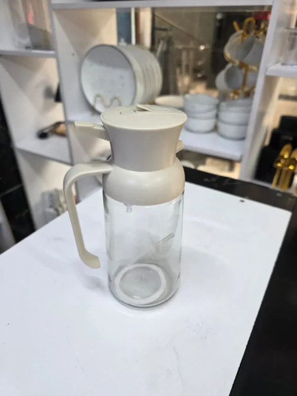 Leak proof oil dispenser