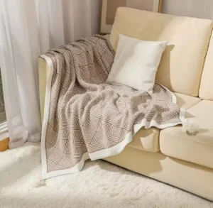 Knitted throw blanket