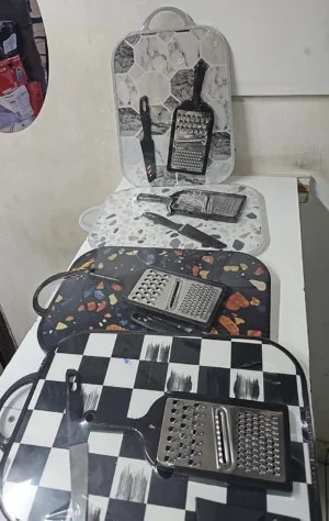 Kitchen cutting board with grater