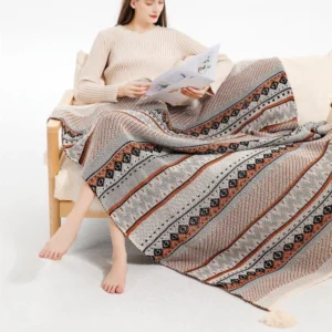 Tassel edge knitted blanket